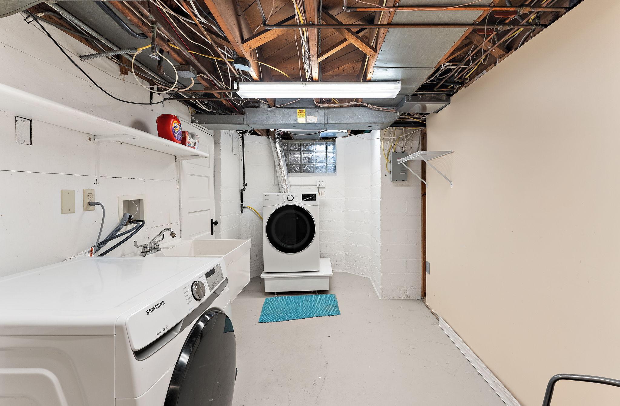 Laundry Room in LL with updated washer and dryer.