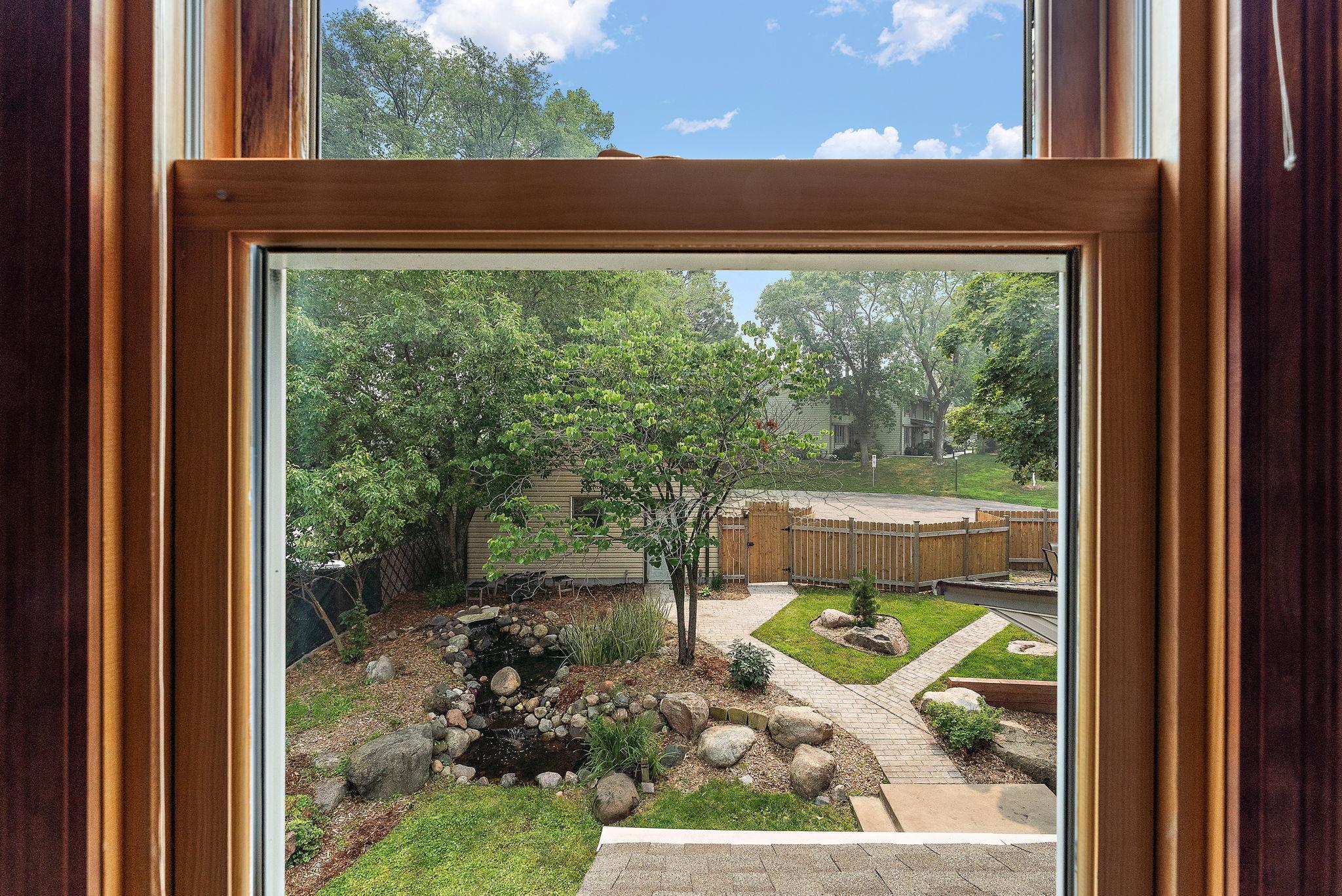 Upper Level Landing area looks over the waterfall and gardens.