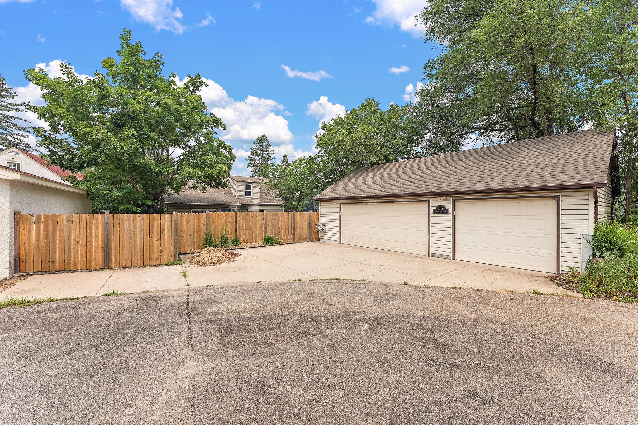 Amazing 3 car garage and concrete driveway. Mulch included. Its crazy that this house is located on TWO separate cul-de-sacs!