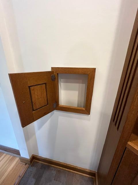 Towel Chute in the kitchen drops iinto the laundry room below.