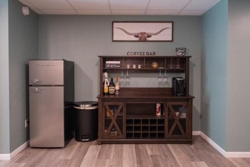 Family room (plumbed for a wetbar behind cabinet)