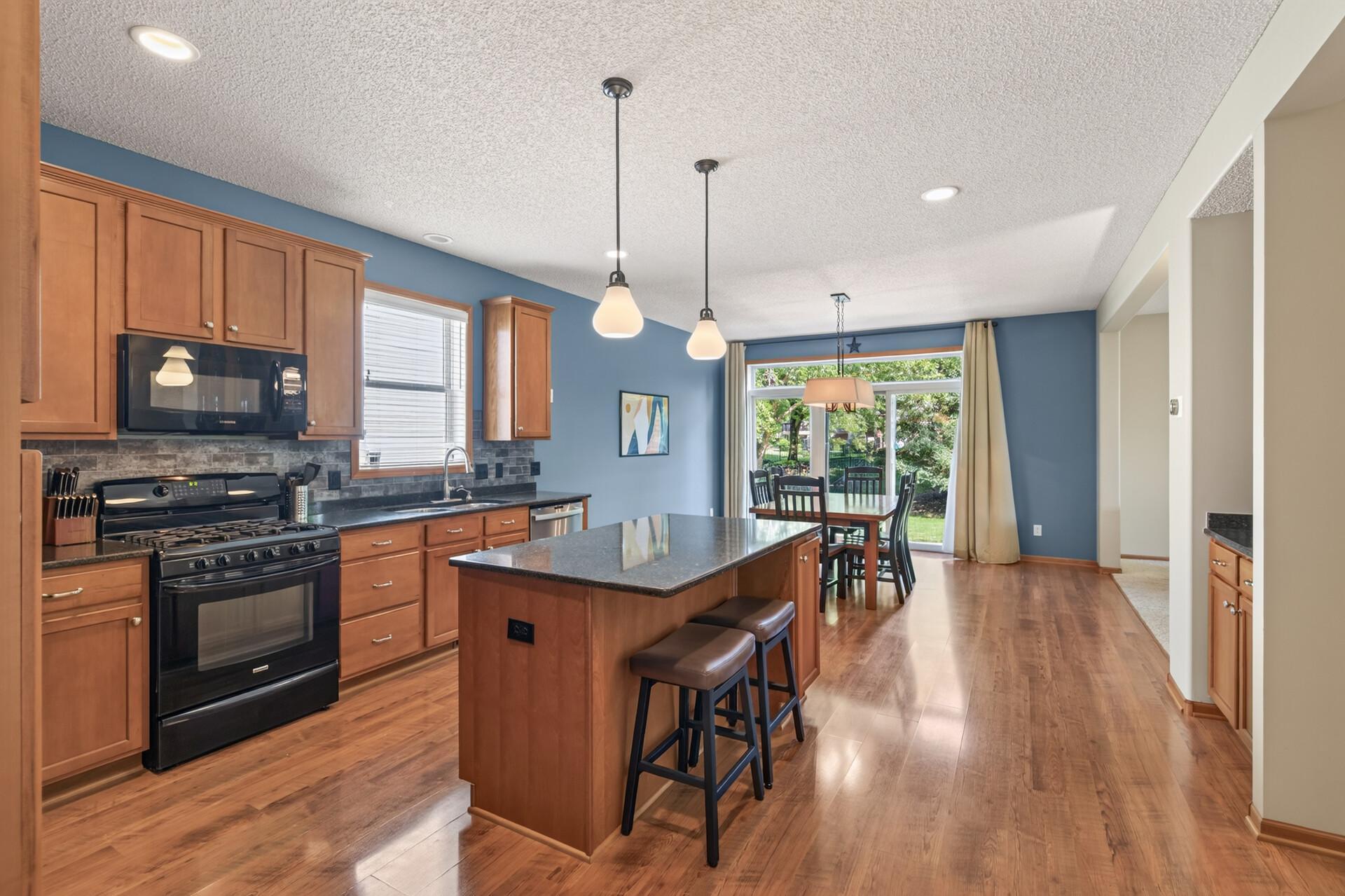 Love the kitchen with beautiful flooring and center island