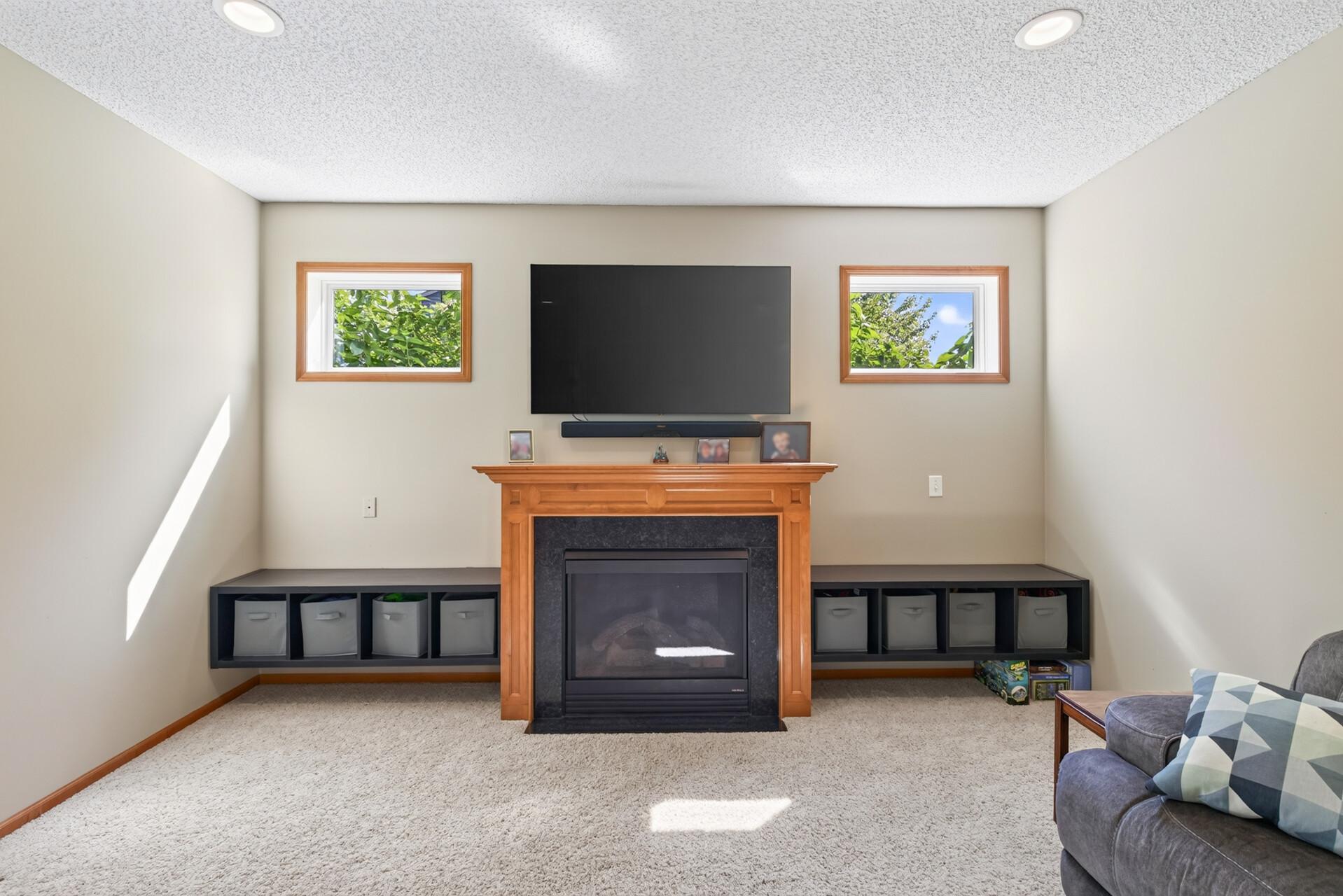 Fireplace with built ins on the sides