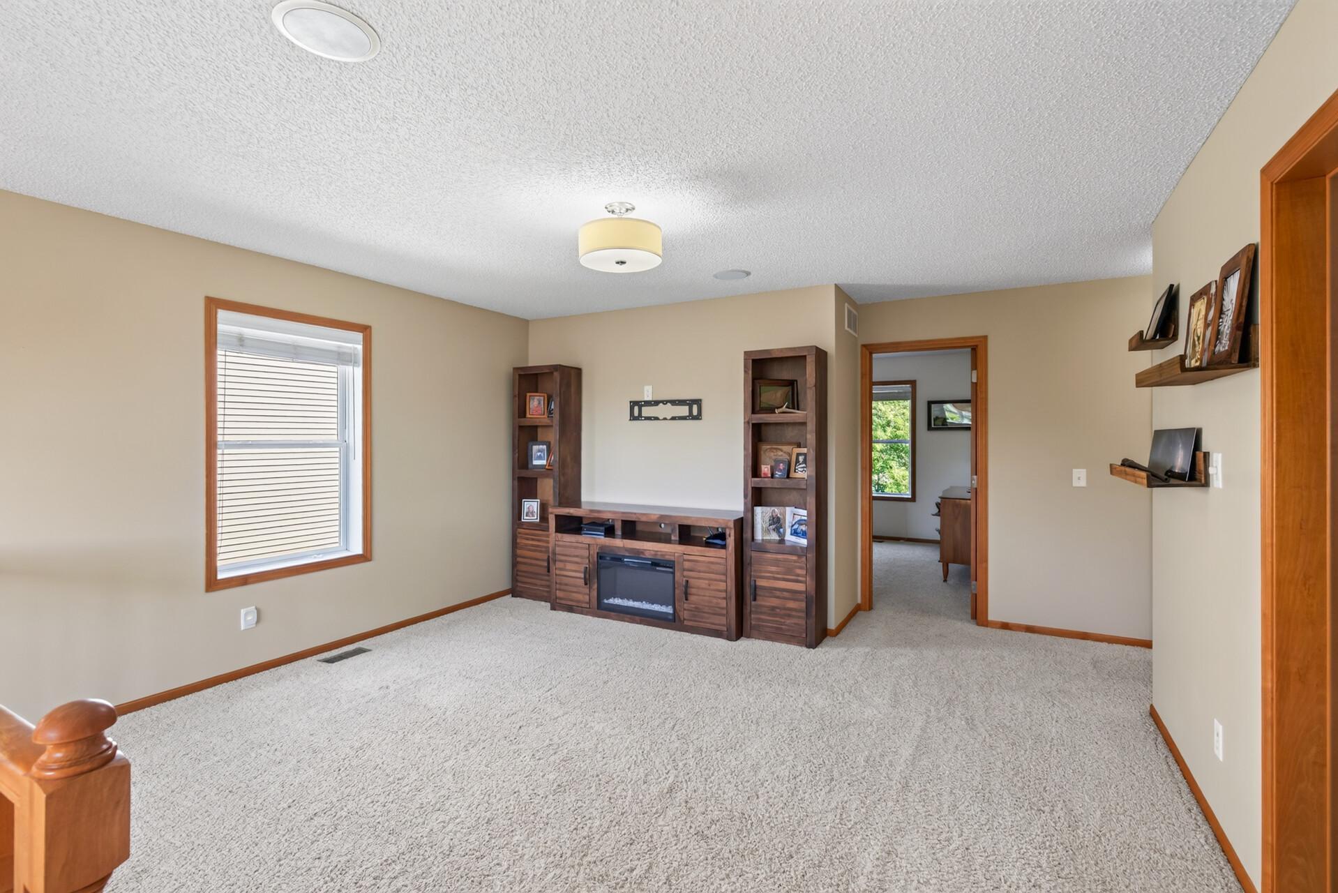Upper level loft - plenty of space for a family room - toy area - or office