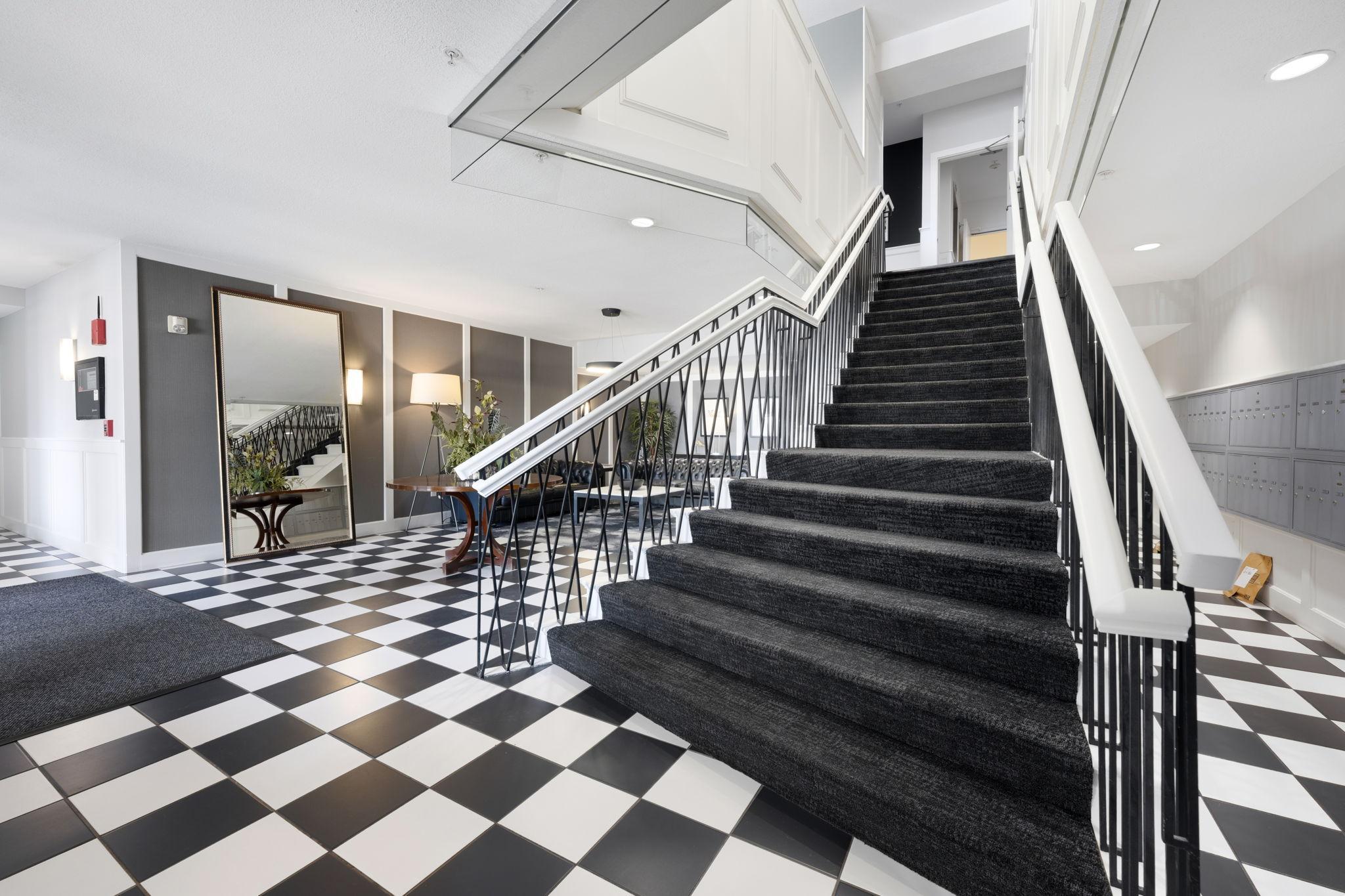 Beautifully updated lobby with grand staircase, secure entry, and welcoming common spaces.