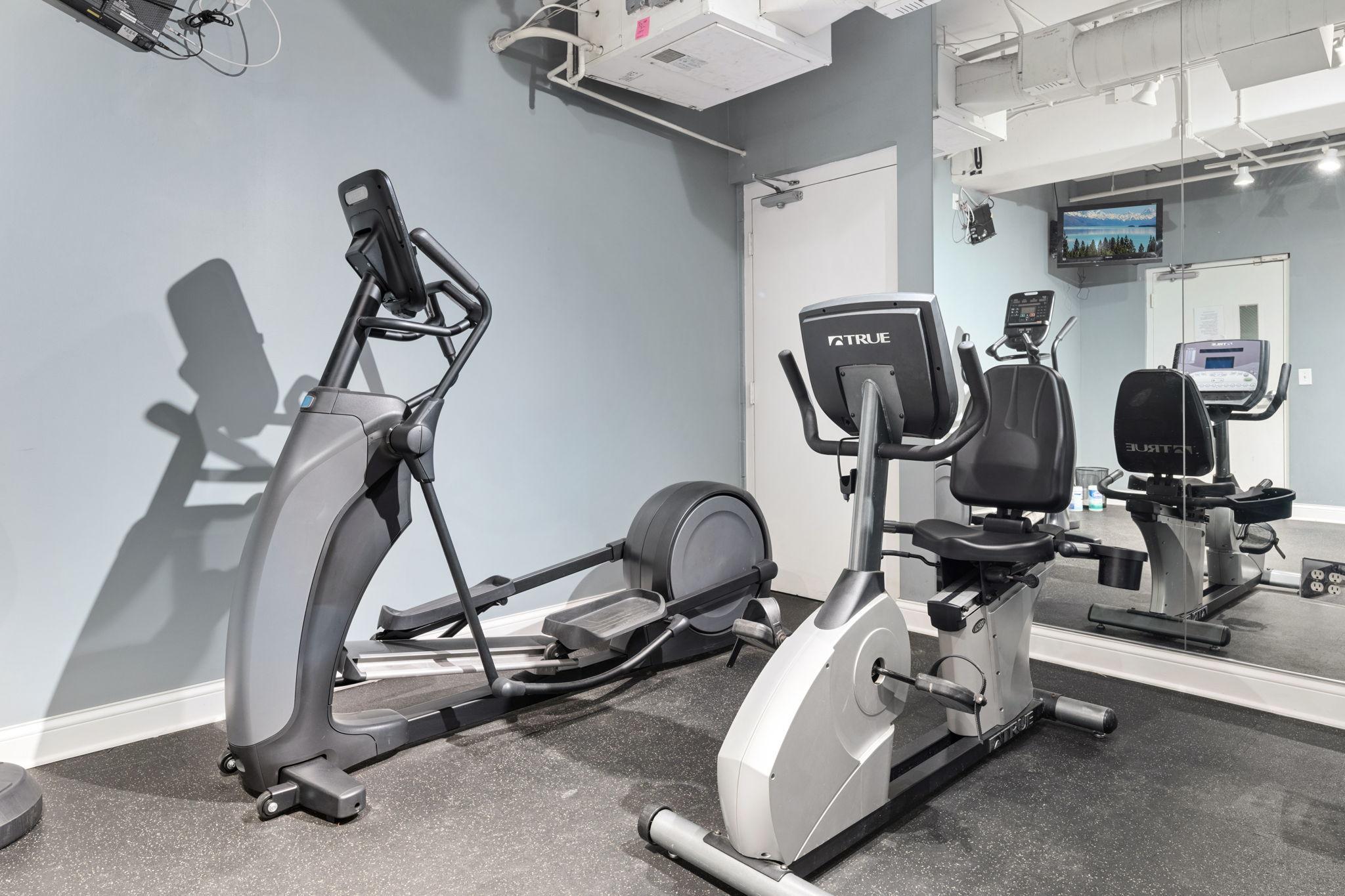 Well-equipped exercise room offering convenient on-site fitness options.