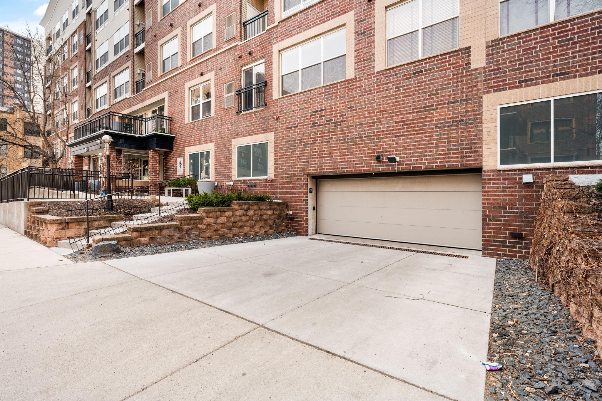 Heated underground garage (P2) entry offers added convenience year-round.