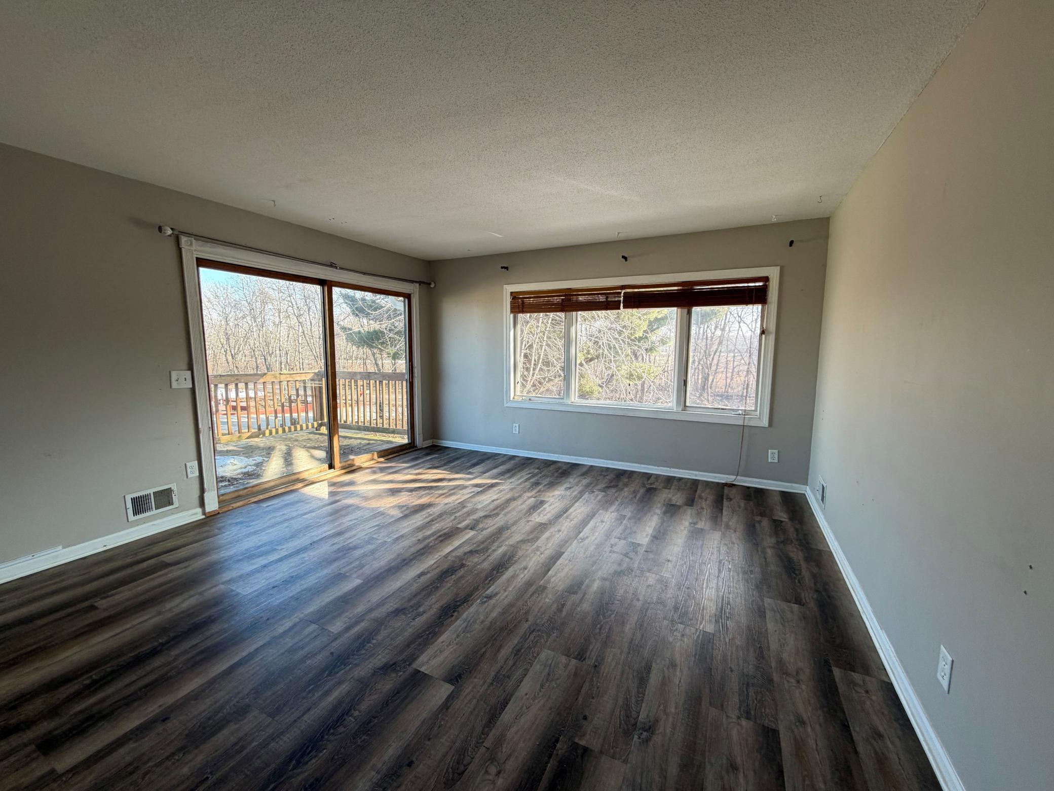 1251 167th living room * High grade vinal planking flooring here.