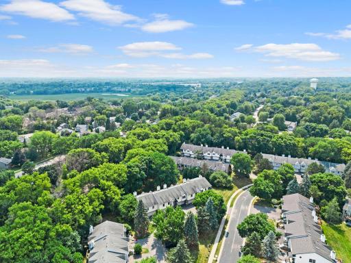 Additional updates include electrical improvements (2021) and a new garage door and opener (2022). Enjoy maintenance-free living with the HOA covering lawn care, snow removal, exterior maintenance, and sanitation.