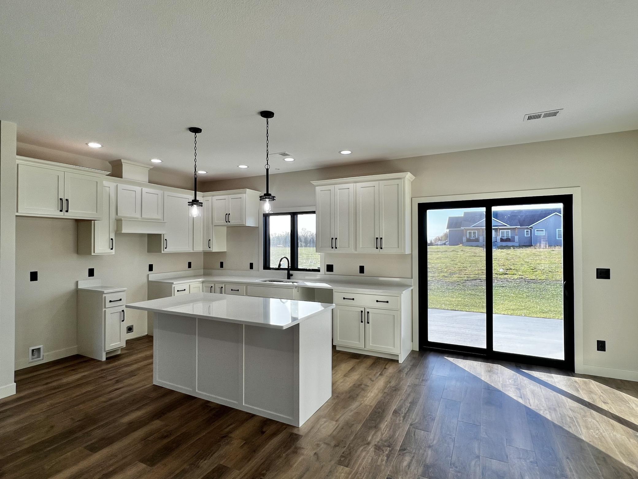 Kitchen with a view of the back patio.