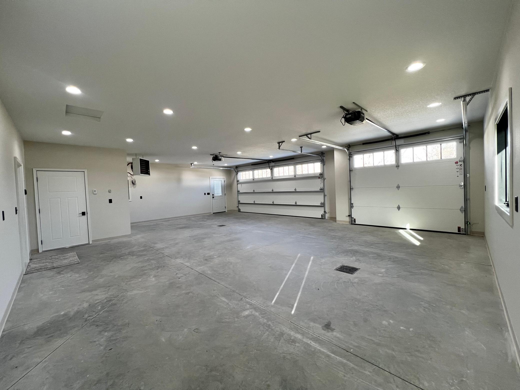 3 Car Insulated, Heated & Finished Garage.