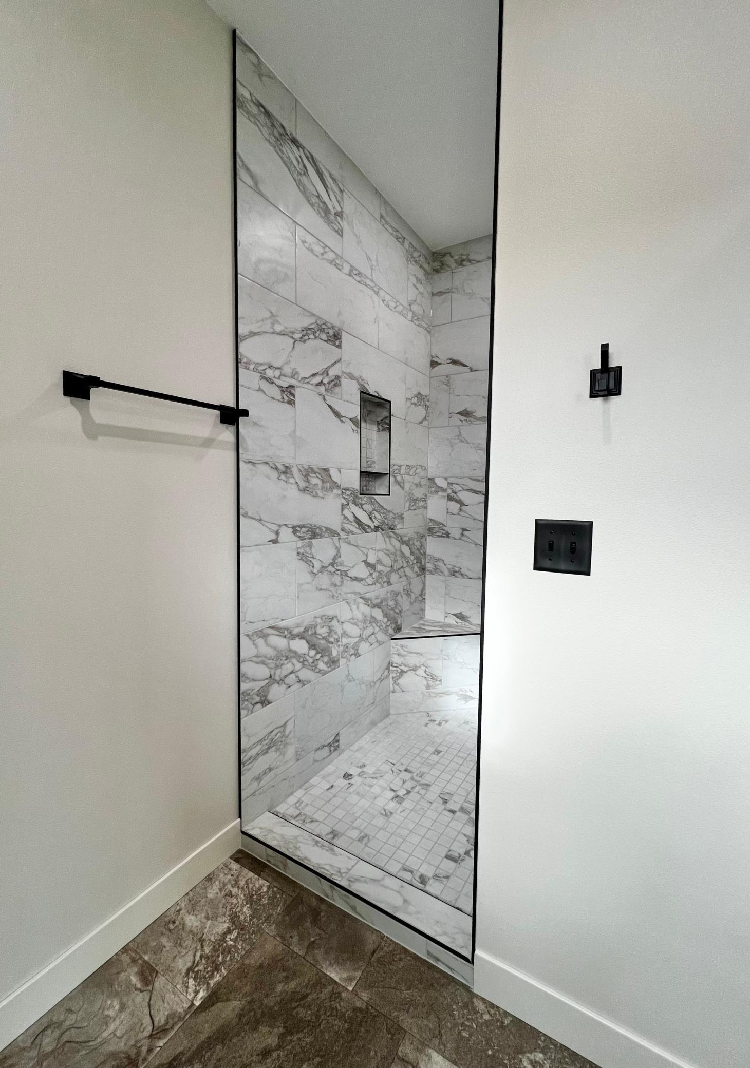 Primary Bathroom Walk in Tile Shower.