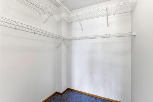 Spacious walk-in closet in primary bedroom
