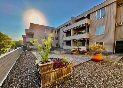 Lovely large communal patio deck for grilling & lounging outdoors