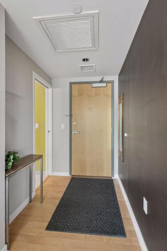 Entering in you'll be greeted with floor to ceiling windows and a spacious coat closet