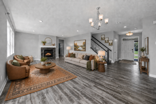 Great Room - Stairway and Entry Virtual Staged