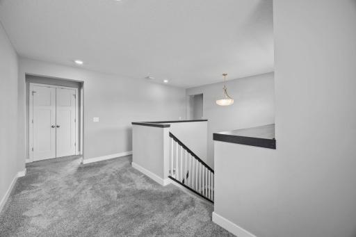 4 bdrms, 3 full baths and laundry on upper level