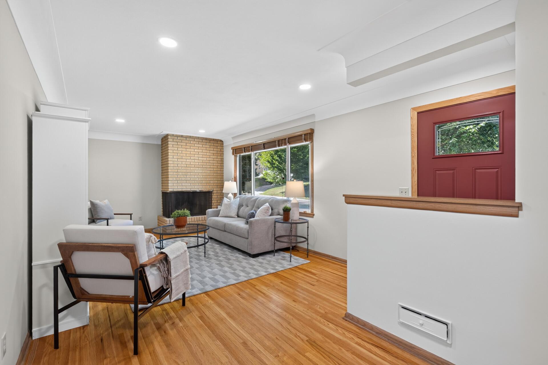 The inviting living room is bright and spacious