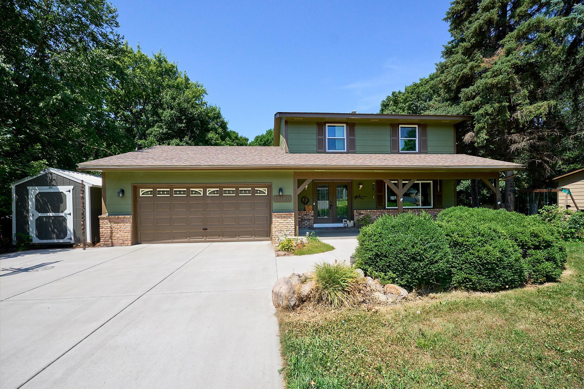 3 bedrooms, 2 baths, Concrete driveway, 13 new windows, new front door, siding painted in 2025, and park-like fenced yard.