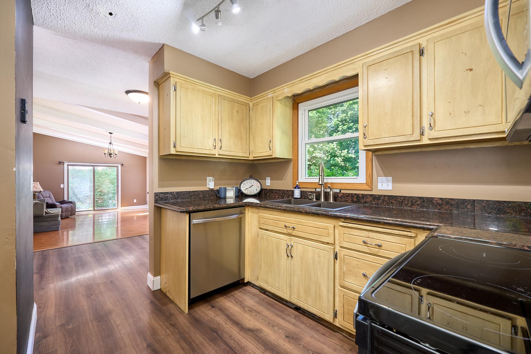 Kitchen opens to dining room & family room.