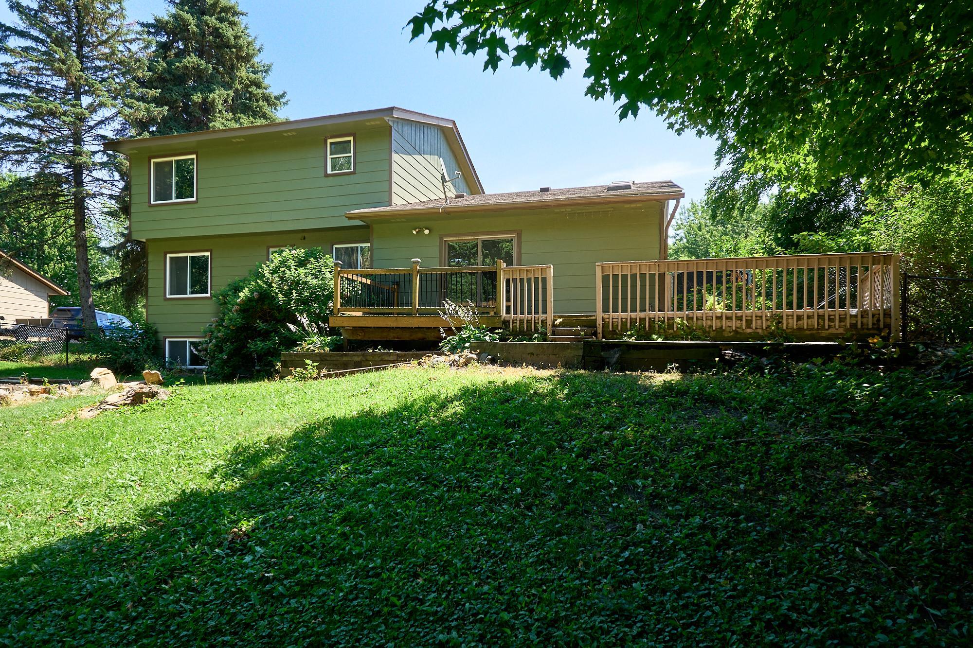 Multi-level deck & patio. A wonderful place to grill & enjoy the backyard.