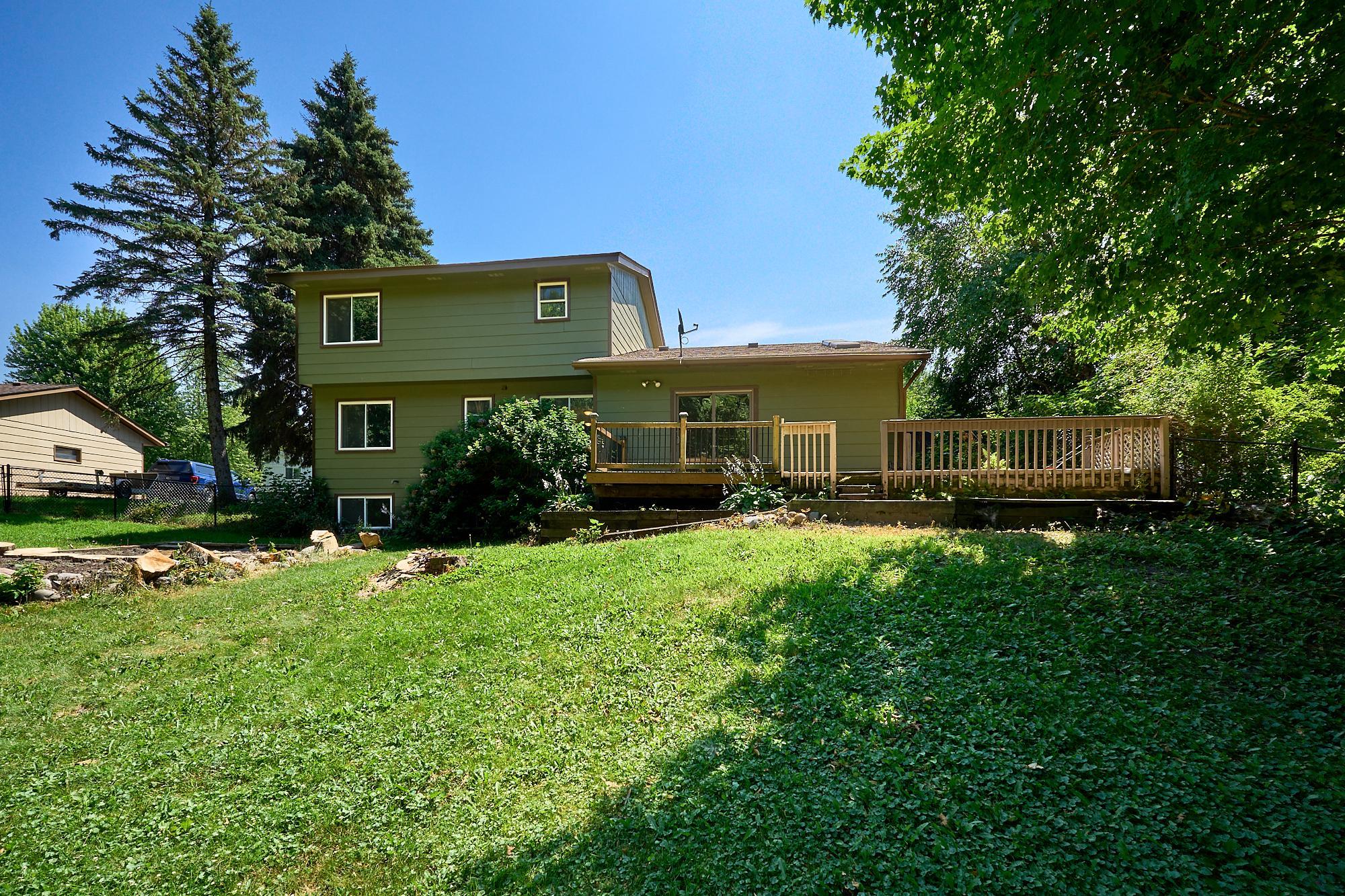 Beautiful backyard. Plenty of sun for gardening & yard games. Shaded areas for relaxing and enjoying summer days. Patios & deck make grilling, entertaining, and relaxing easy in this private fenced yard.