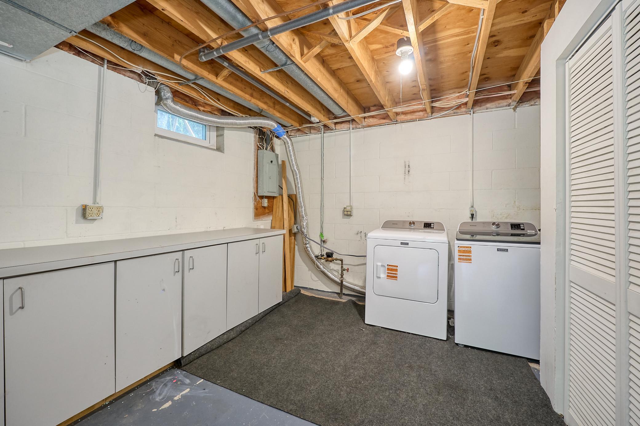 Lower-level laundry room, clean and bright