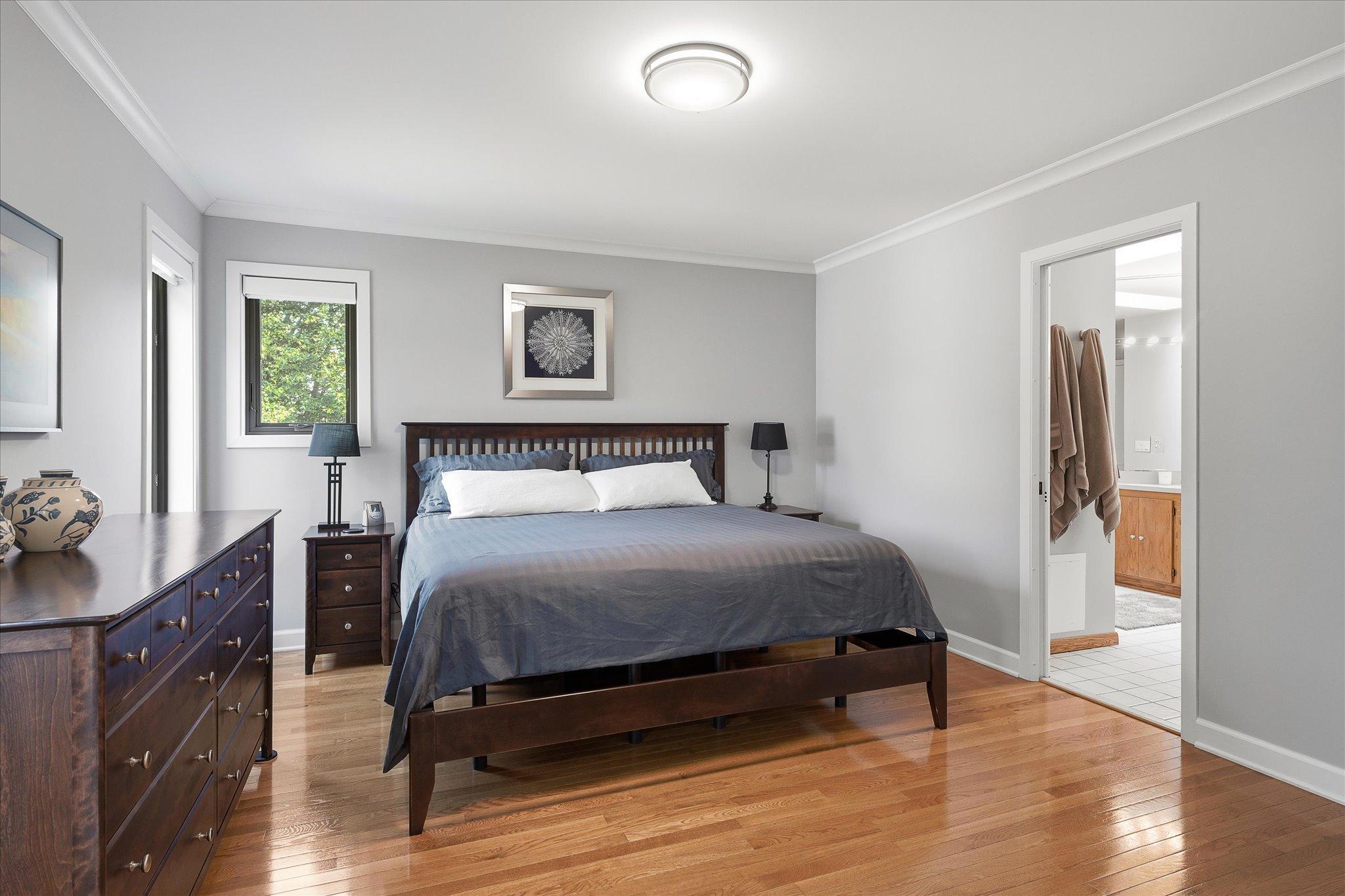 Another view of primary bedroom