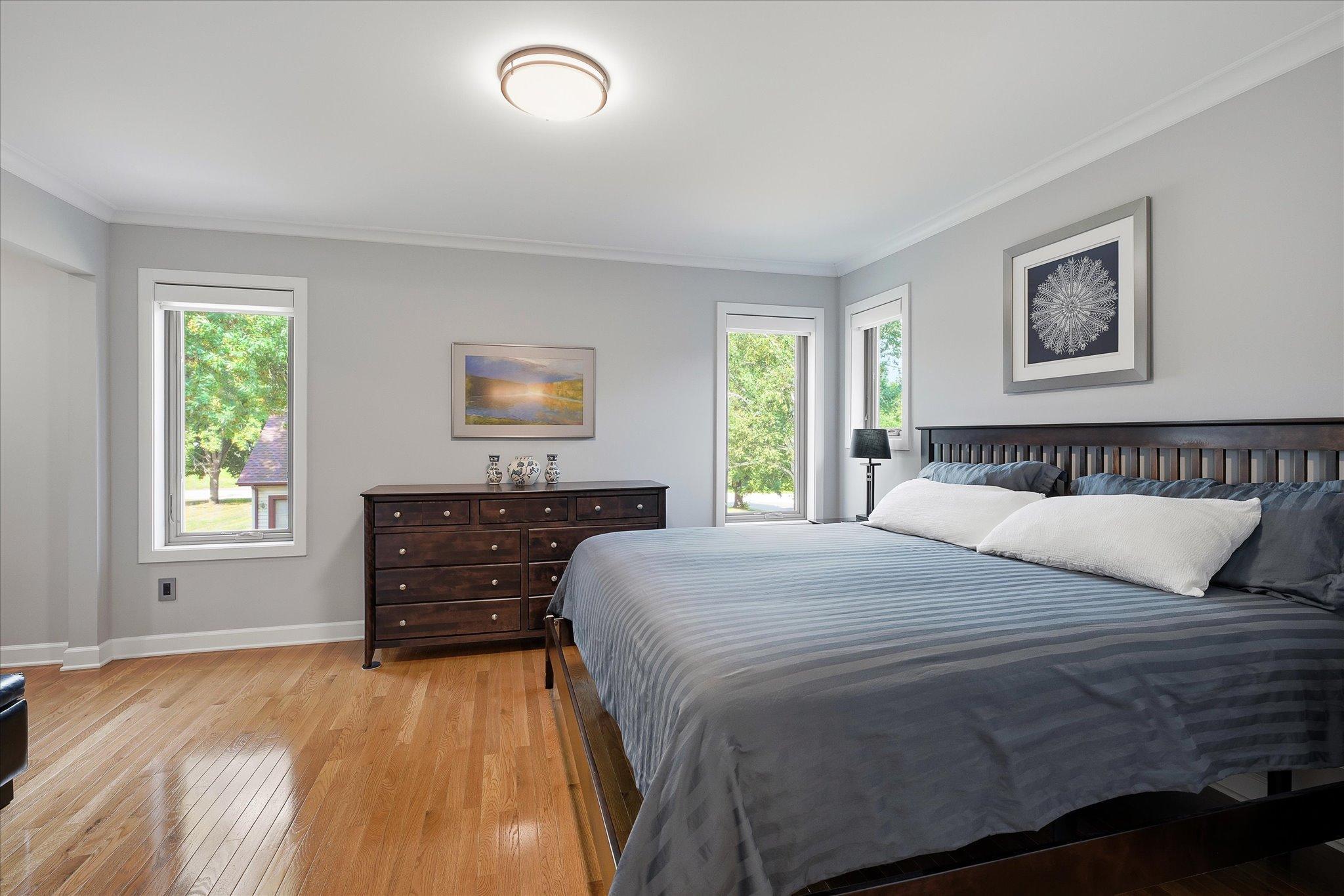 Gleaming hardwood floors in bedroom