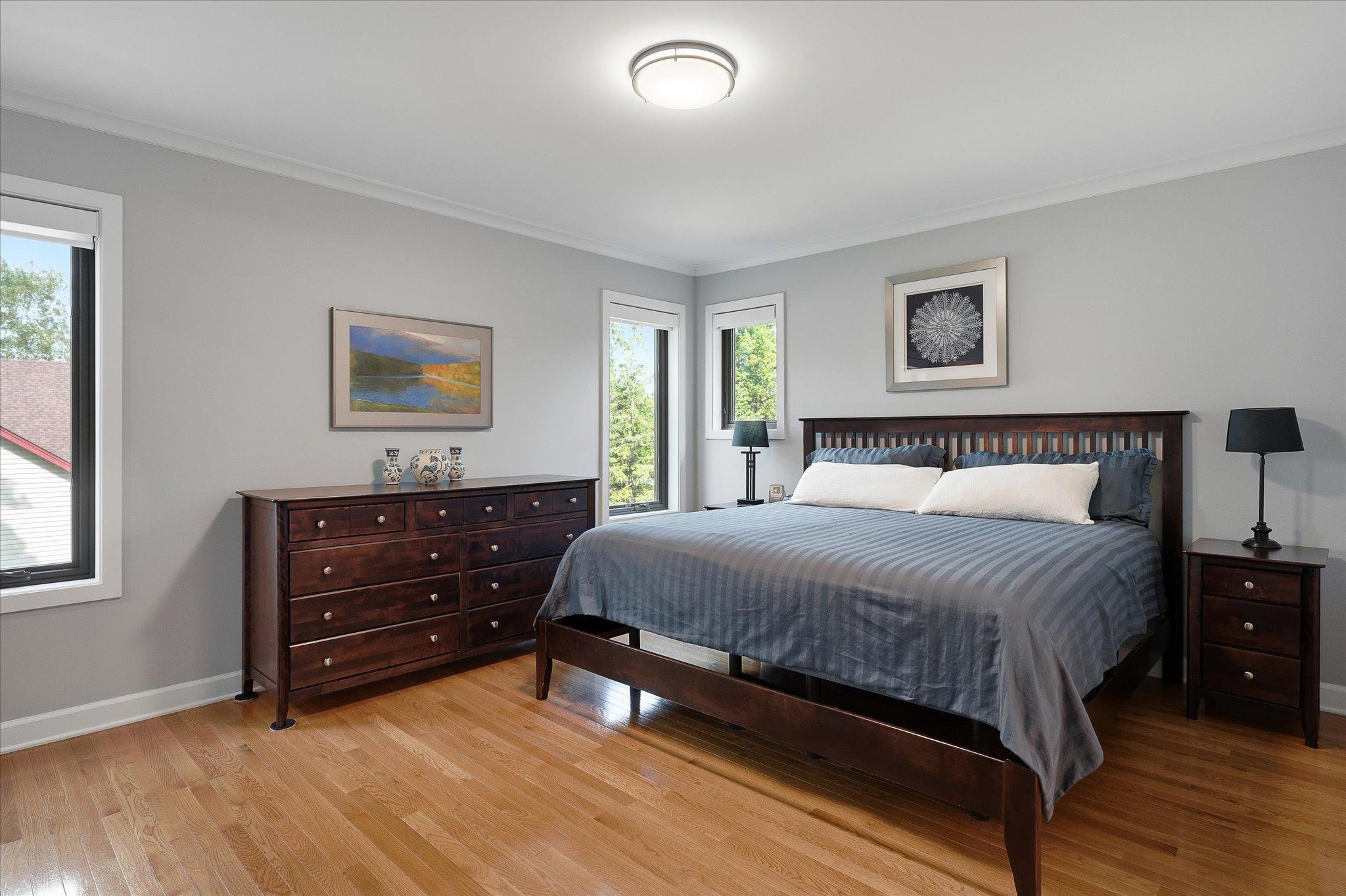 Large primary bedroom with adjacent walk through full bath