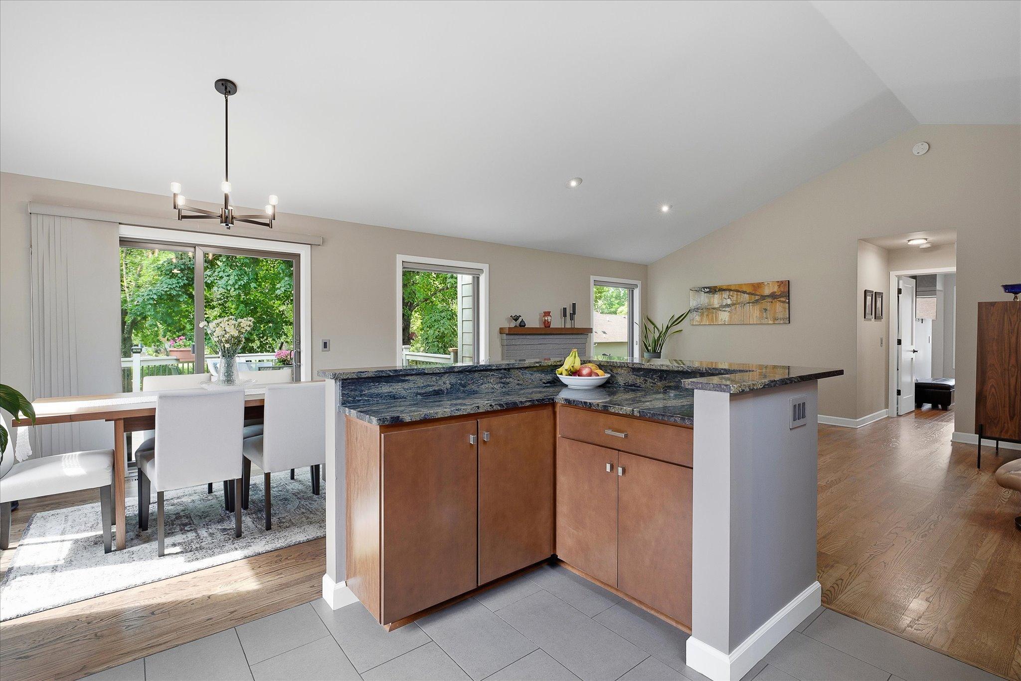 Open floor plan with vaulted ceilings