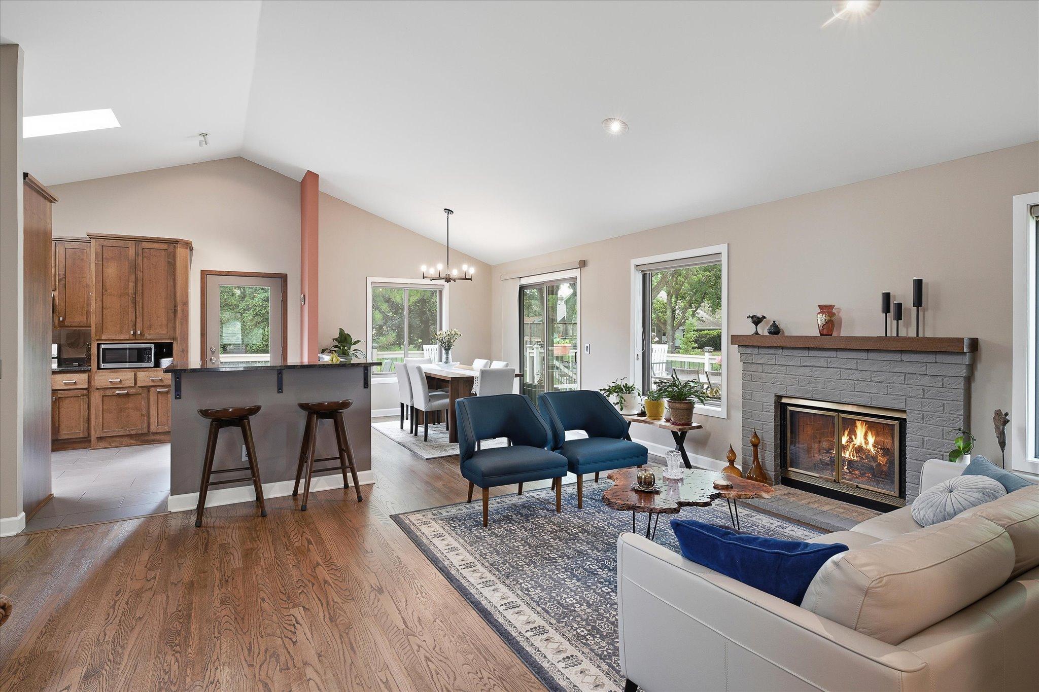 Living room/dining room with wood burning fireplace