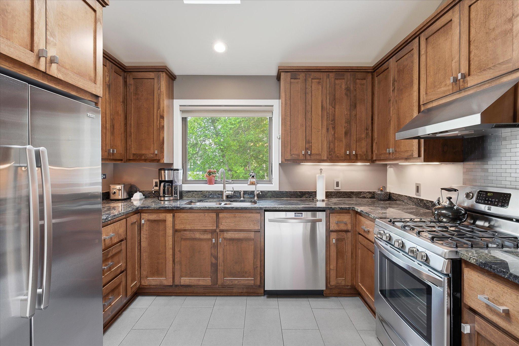 Custom cabinets, granite countertops, s.s. appliances