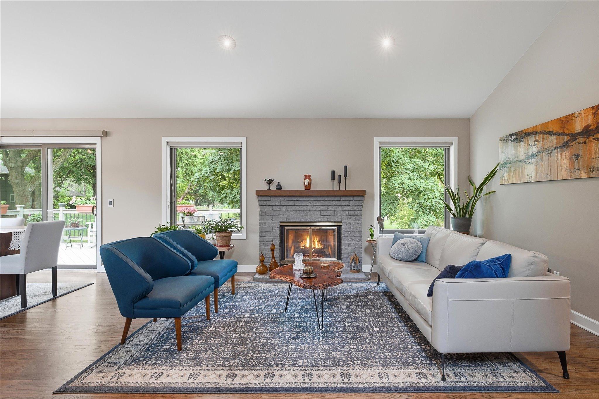 Living room with wood burning fireplace