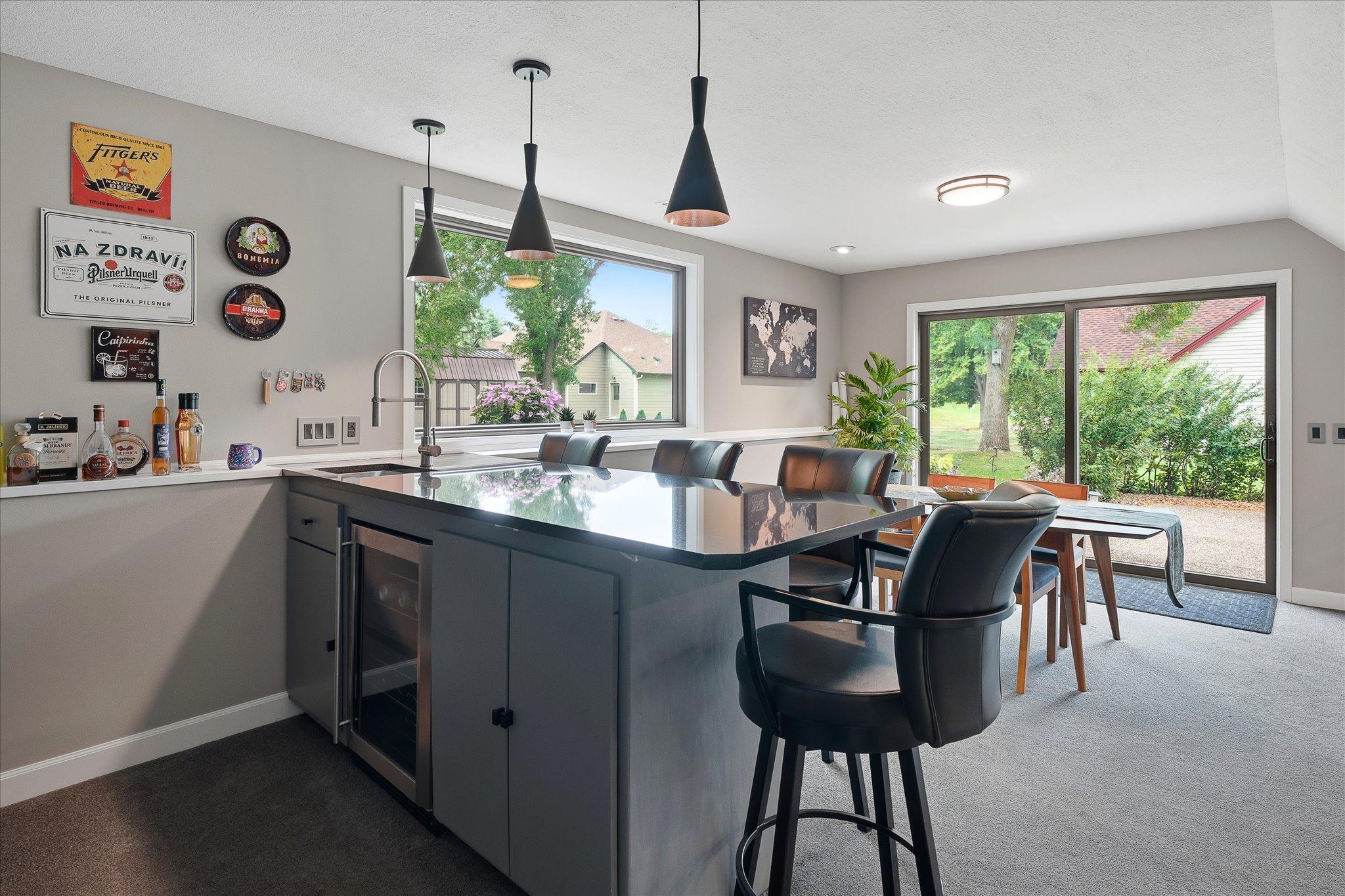 This lower level has large windows and lots of natural light