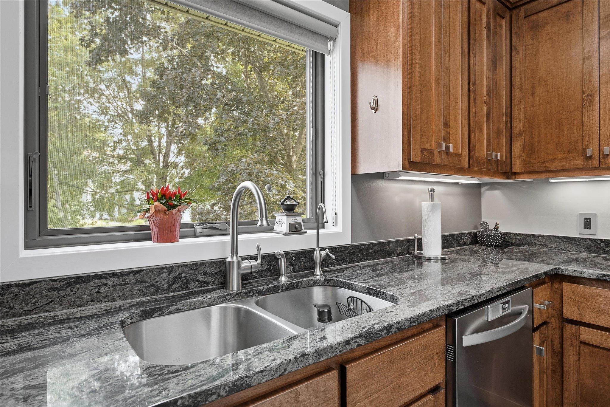 Granite countertops, Andersen Renewal windows throughout the home