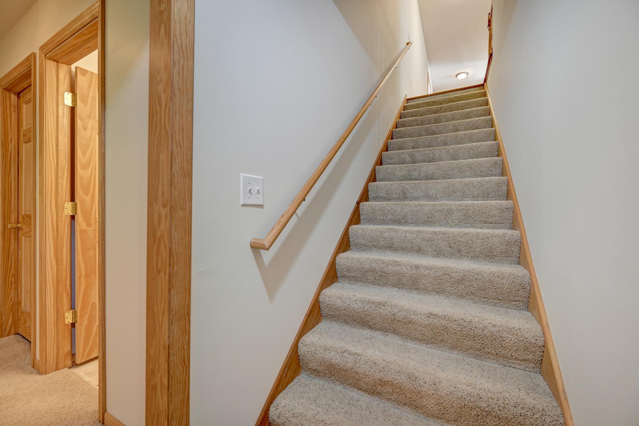 Wide stairs to the basement