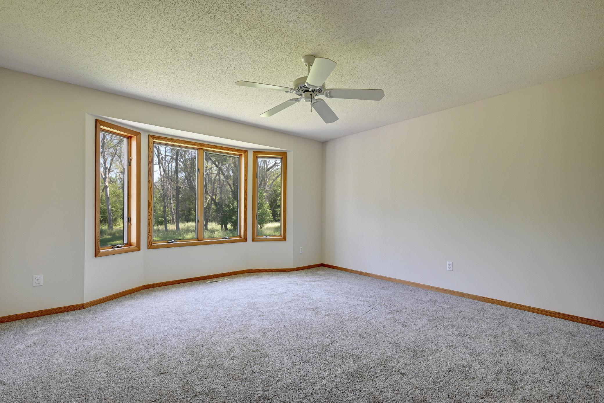 Master bedroom with large windows