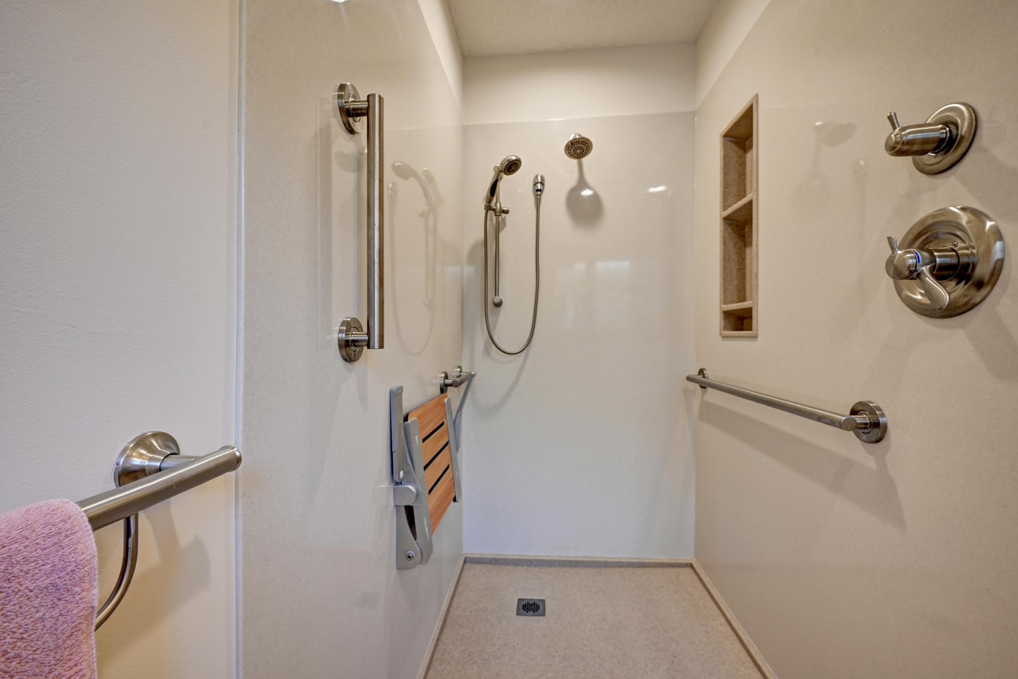 Newly installed walk-in shower with seat