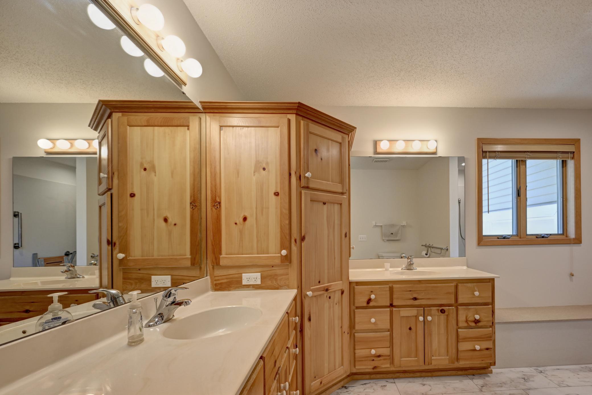 Main floor bath with walk-in shower and bench