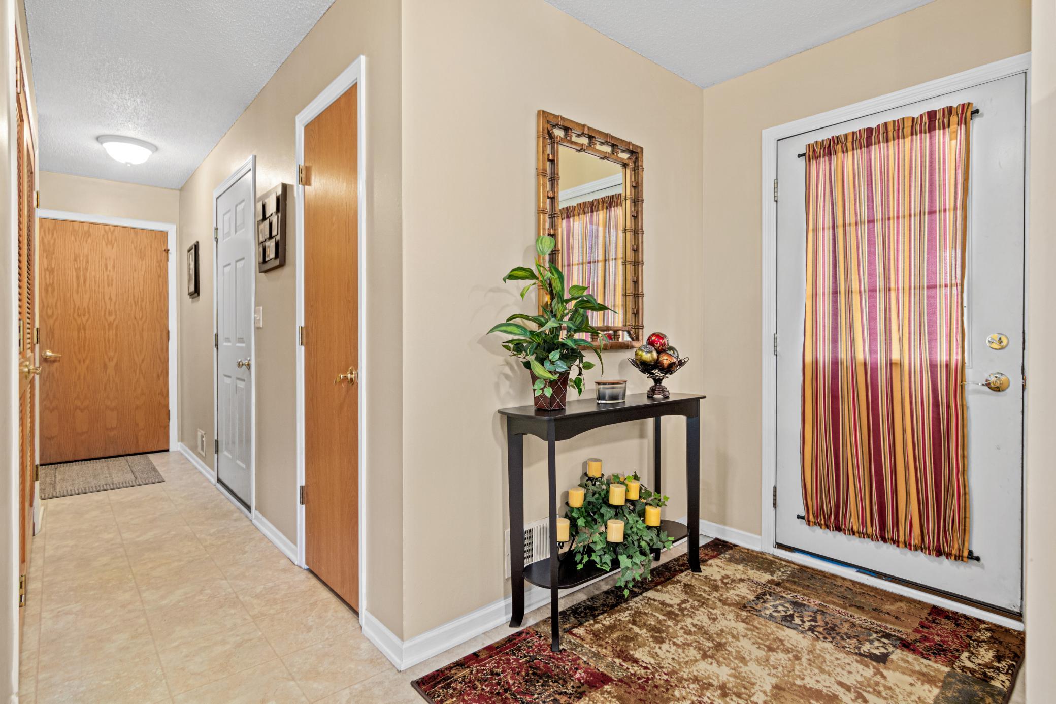 Step inside to a spacious foyer