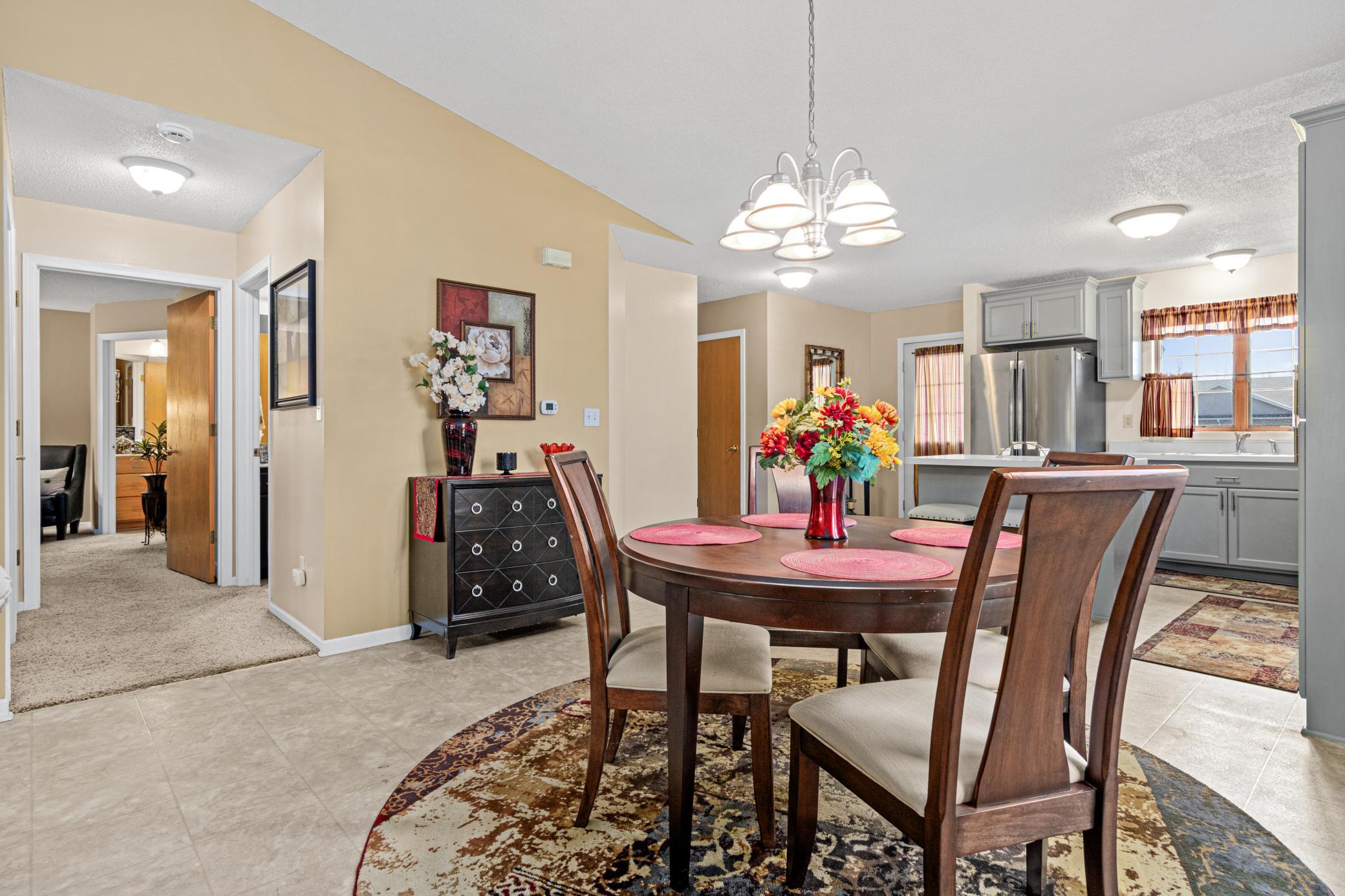 The dining area is equally ready for a quiet dinner or a table full of guests.