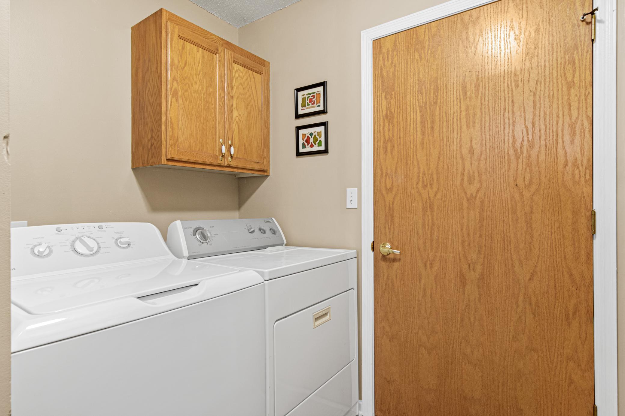Laundry room with built-in cabinet