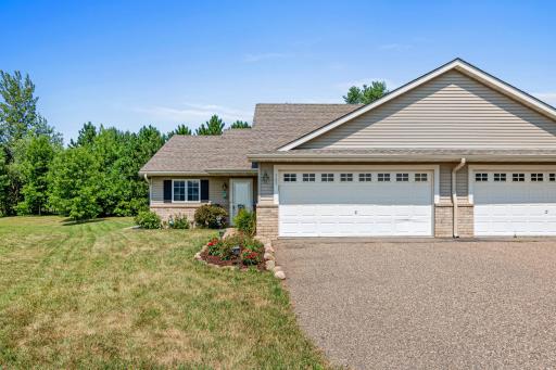 Set along a cul-de-sac in Rolling Meadows with convenient access to US-12 and WI-65