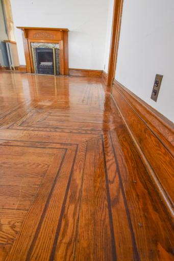 Genuine Oak hardwood floors with inlaid Mahogany on Main Level