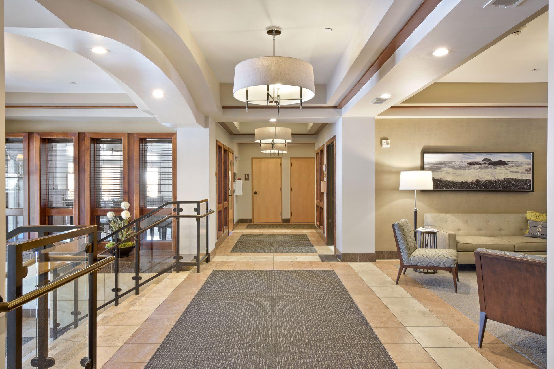 The entrance from the street shows the Community Room, lobby, restrooms and the onsite manager's office.