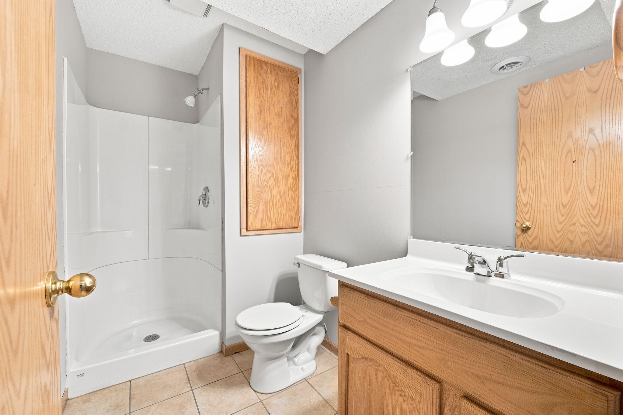 Lower-level 3/4 bathroom.