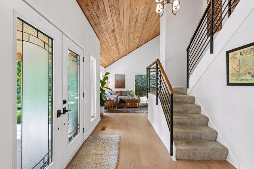 A bright, open foyer offers a welcoming introduction to the home.