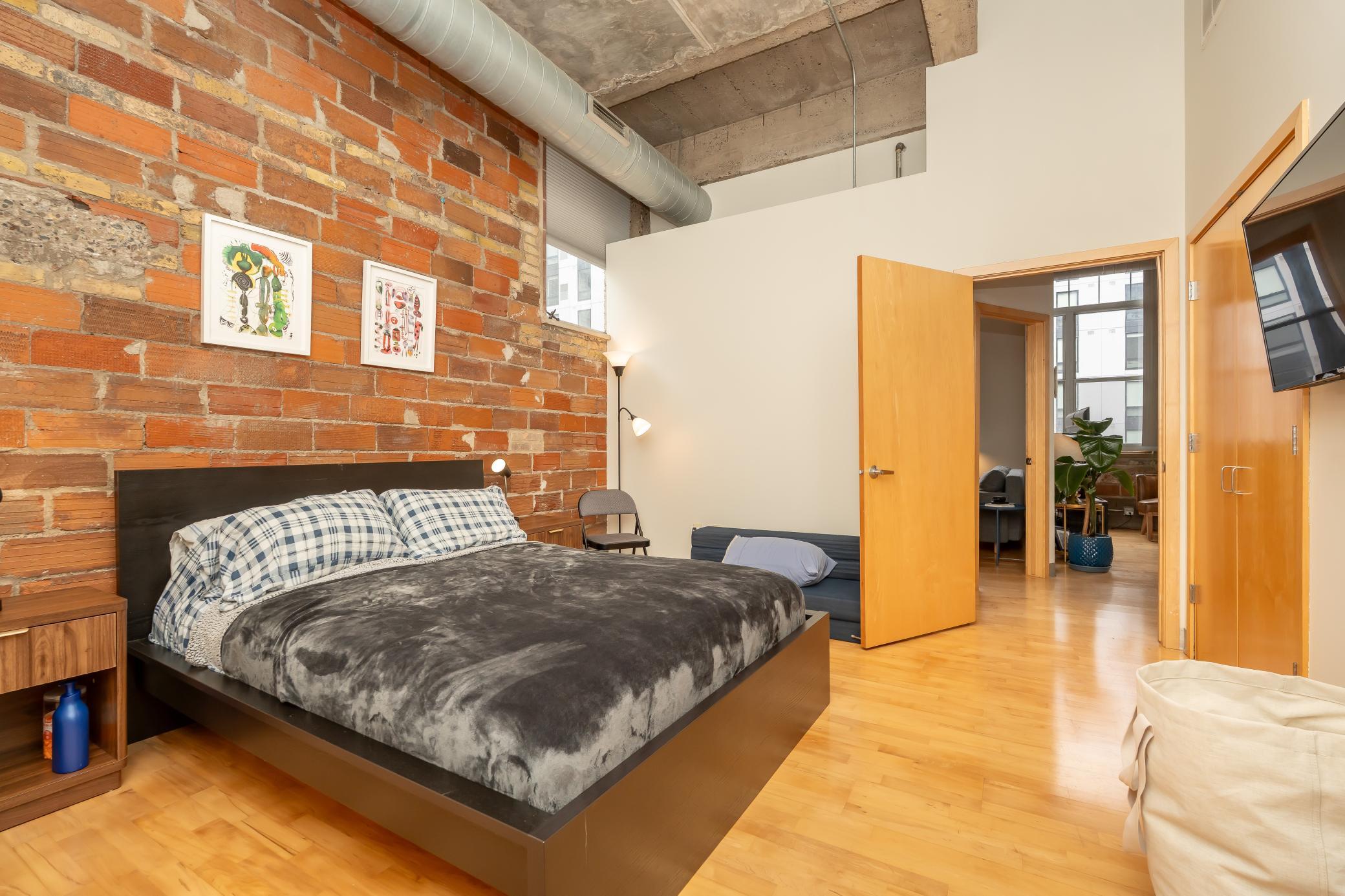 Bedroom #1 cont. - This oversized space offers space for a king-sized bed, additional seating, or a dedicated work-from-home setup without sacrificing openness