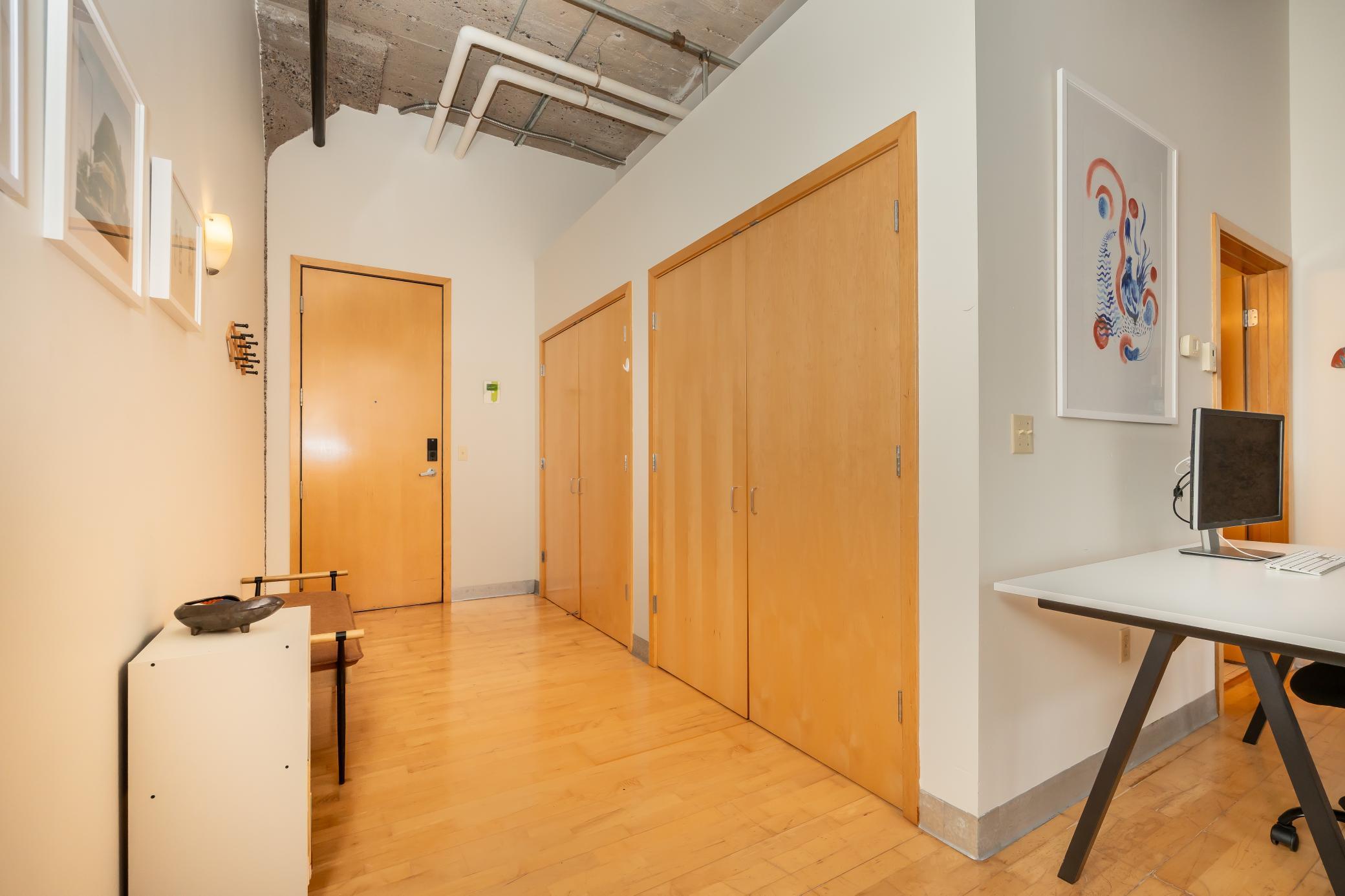 Entry way to this beautiful unit with 2 large closets that provide a ton of space and storage.